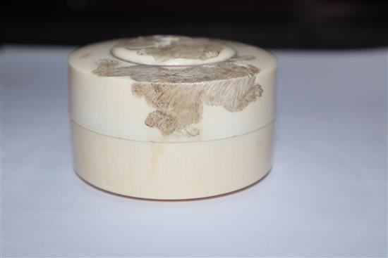 A Japanese ivory box and a Persian painted bone panel